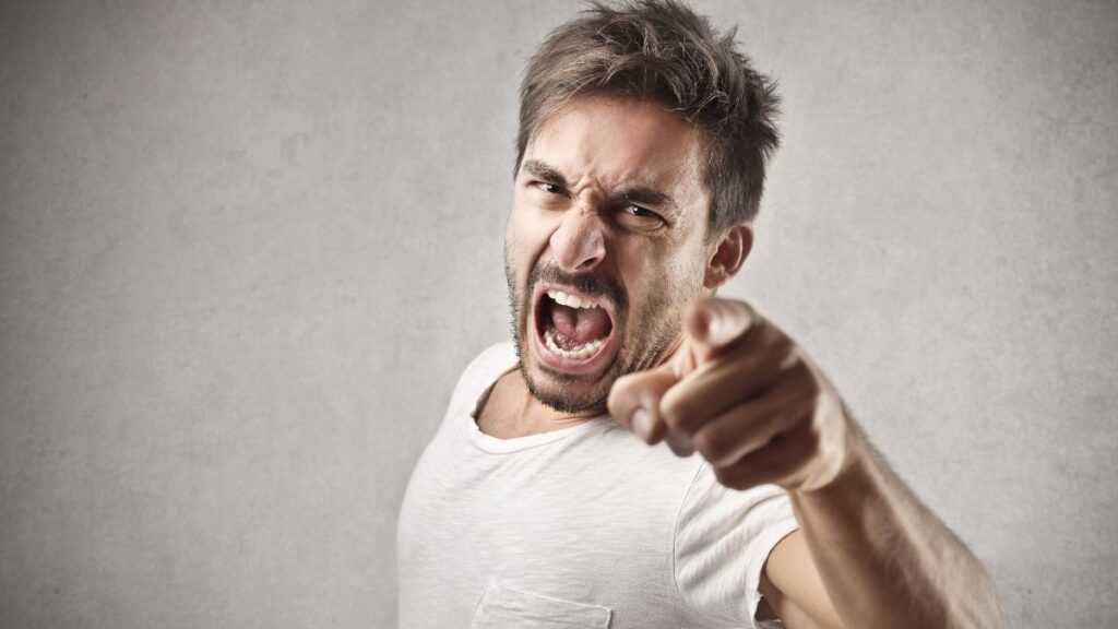 angry man yelling and pointing