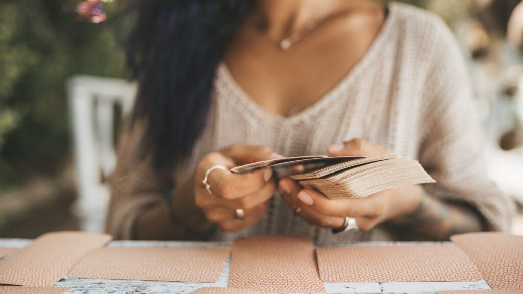 A woman with tarot cards.