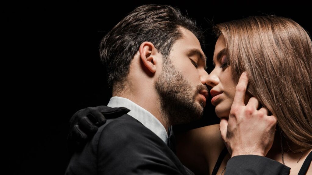 Attractive man and woman kissing