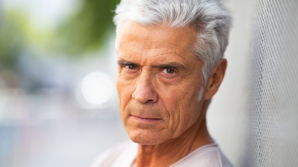 attractive older man looking forward