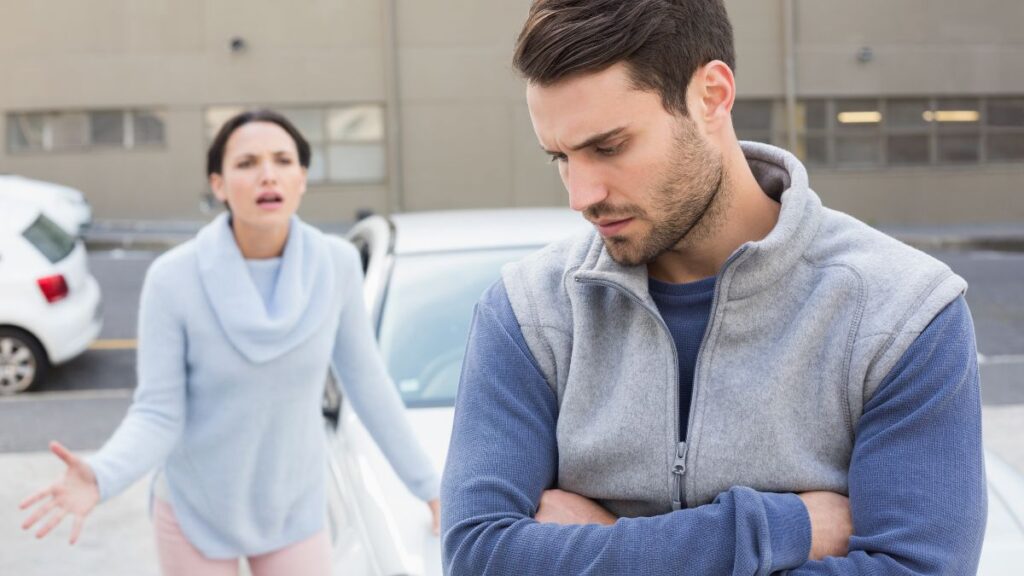 Change couple fighting in a parking lot