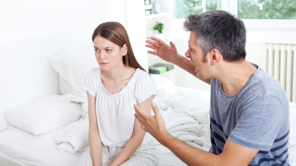 couple fighting man screaming at woman