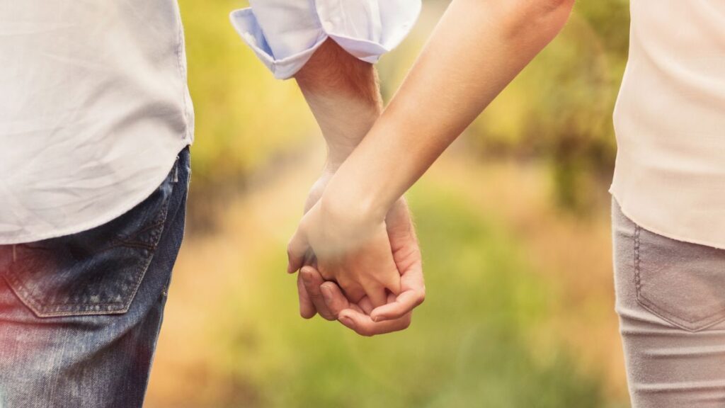 couple holding hands