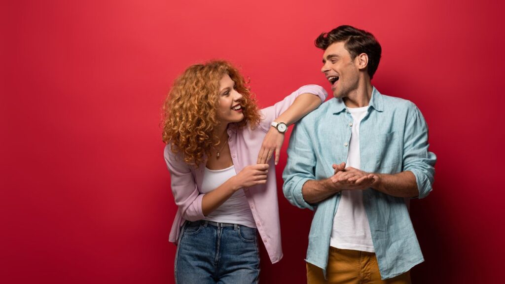 Couple Laughing - Red background