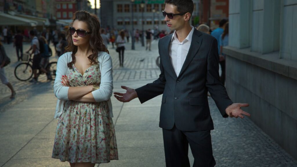 couple looking upset out on the street