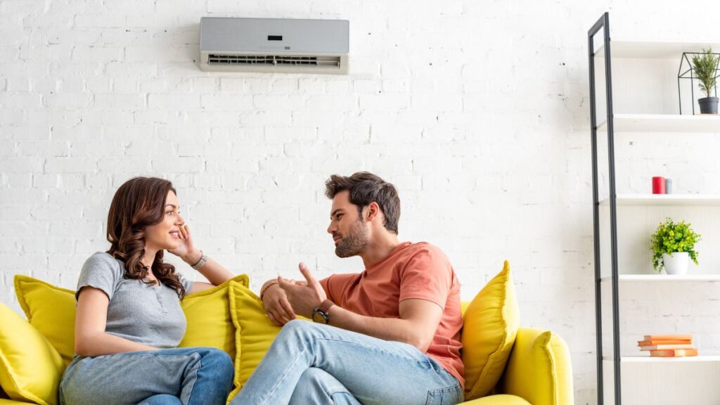 couple sitting on the couch talking