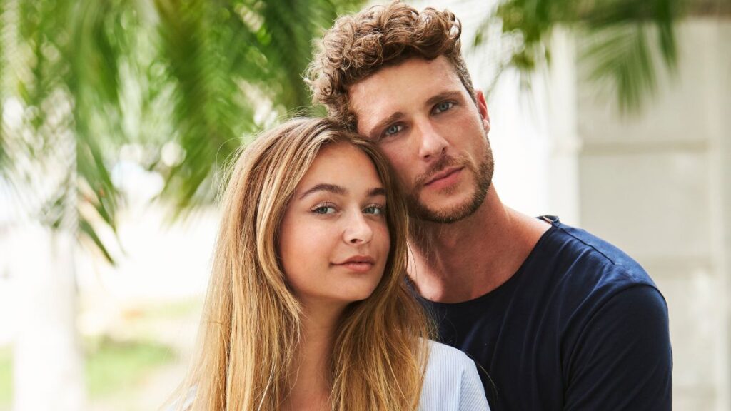 couple standing together snuggling