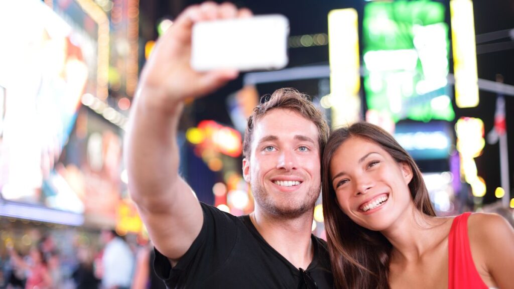 couple taking a selfie and smiling