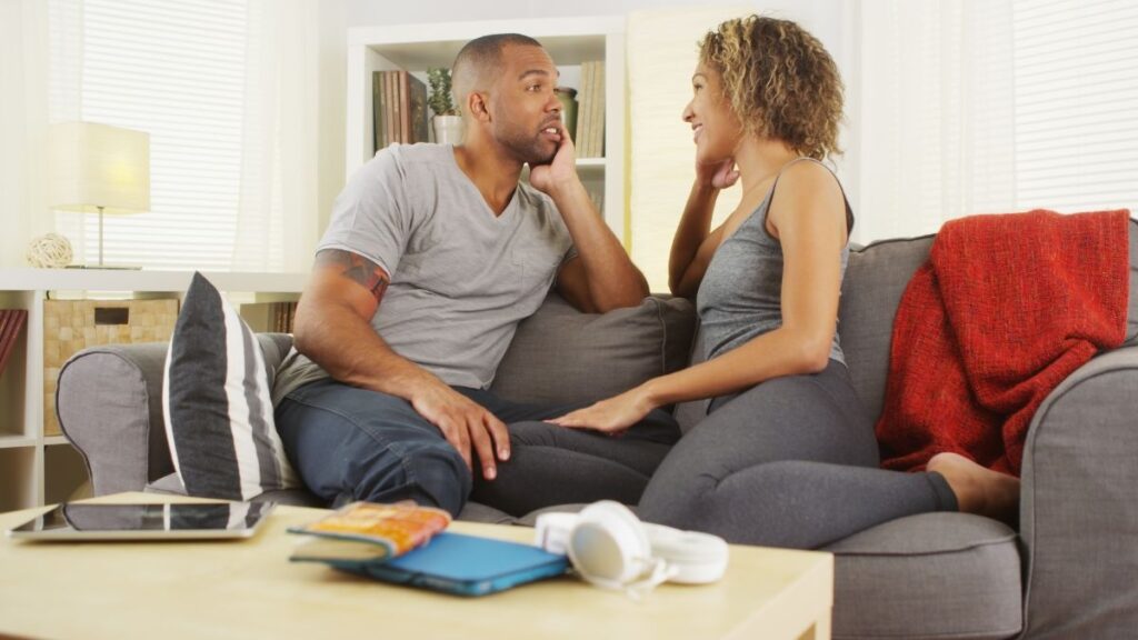 couple talking on the couch