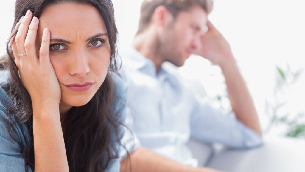 couple upset and looking away