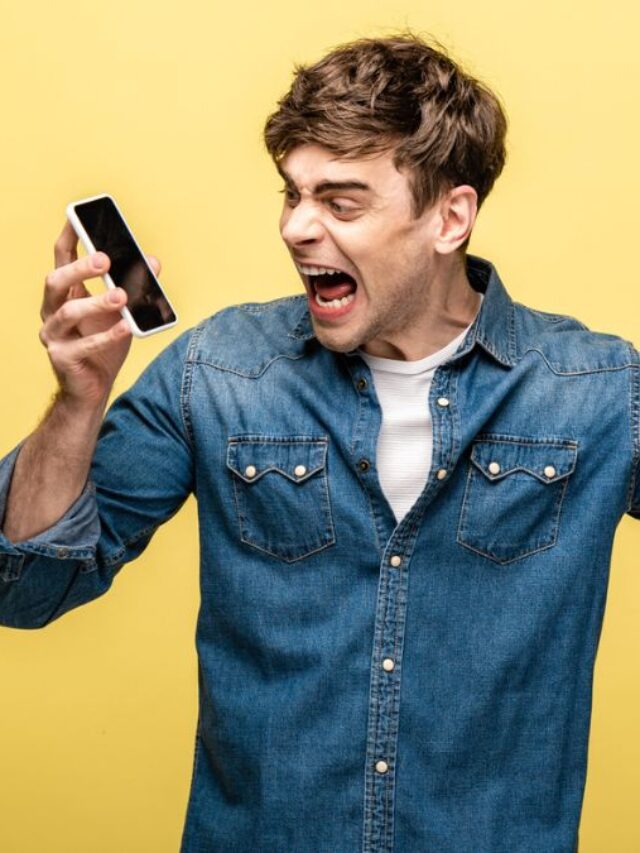 Angry man yelling at his phone