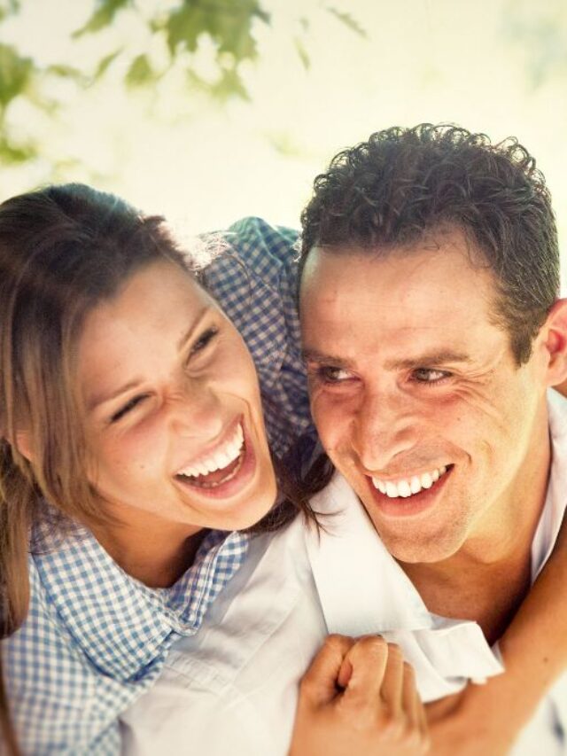 Sense of humor couple laughing together and hugging