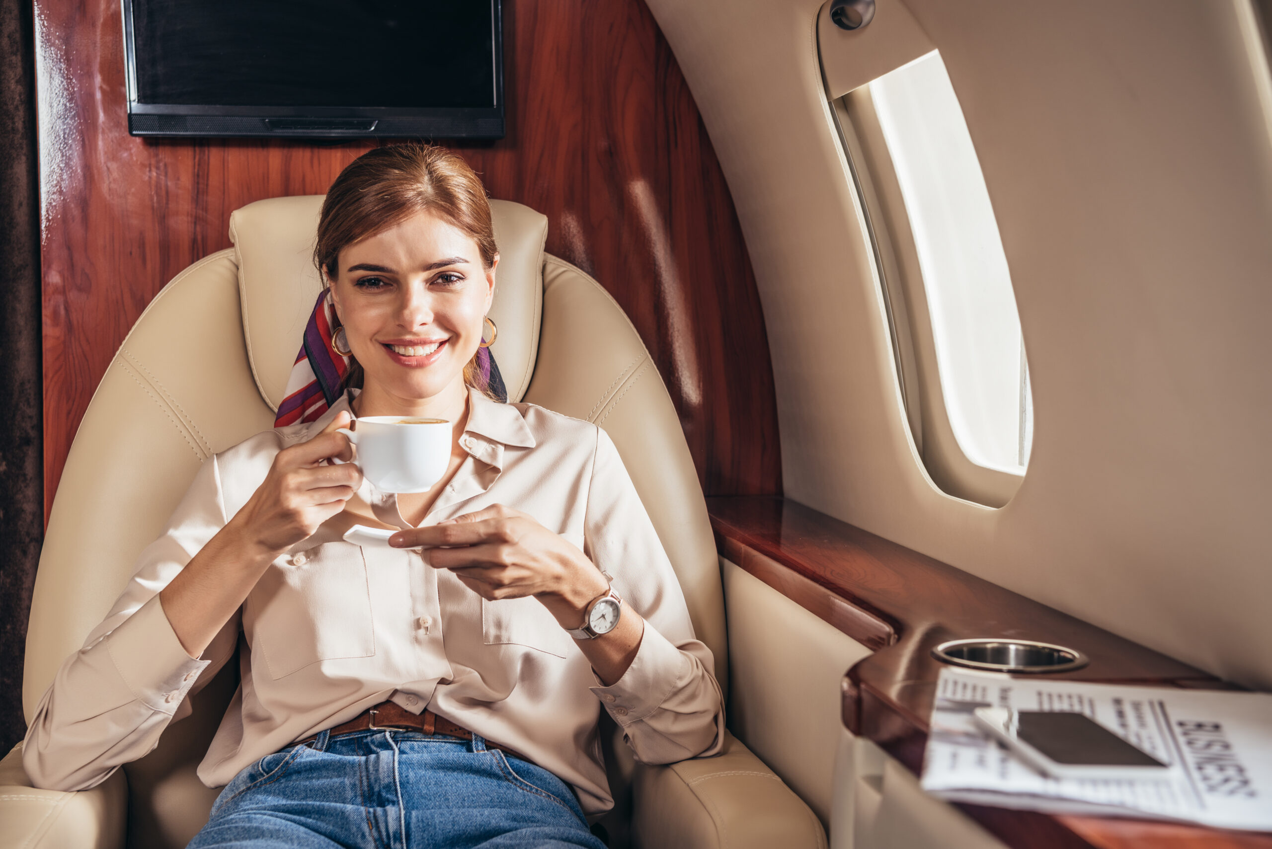 Wealthy woman on private plane