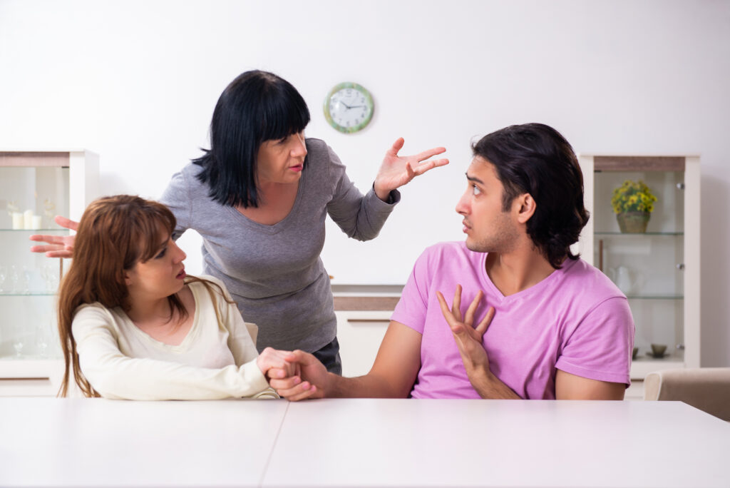 Young family and mother-in-law in family issues concept