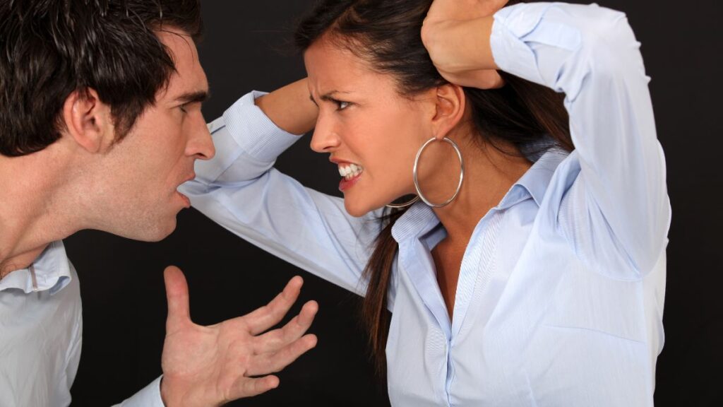 Couple looking angry and fighting verbally