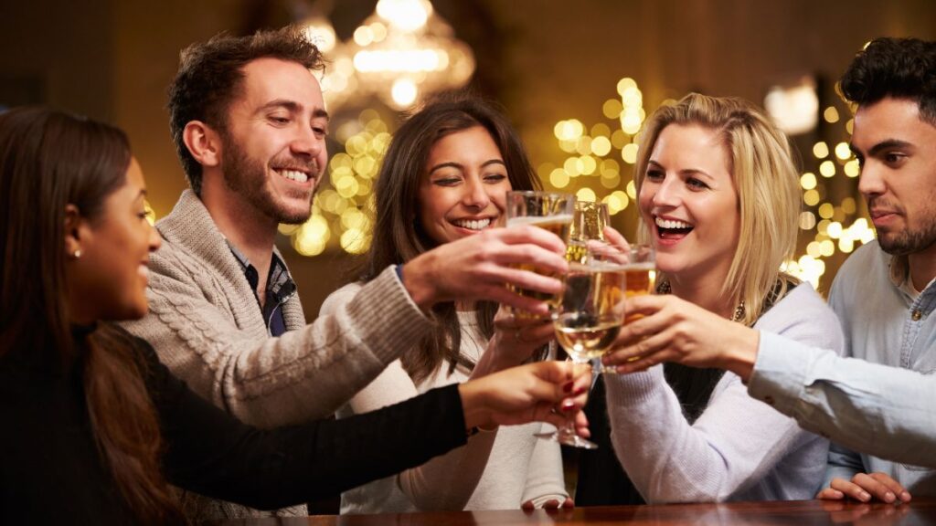 friends toasting and smiling