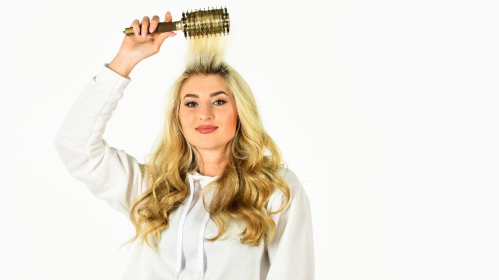 woman brushing her hair