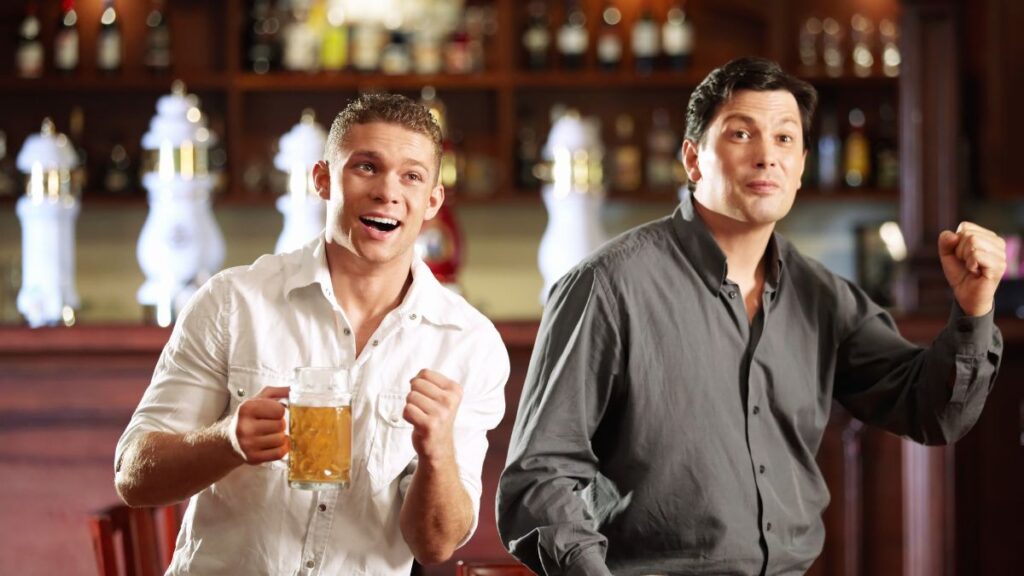 Hype Man two men drinking at a bar having fun