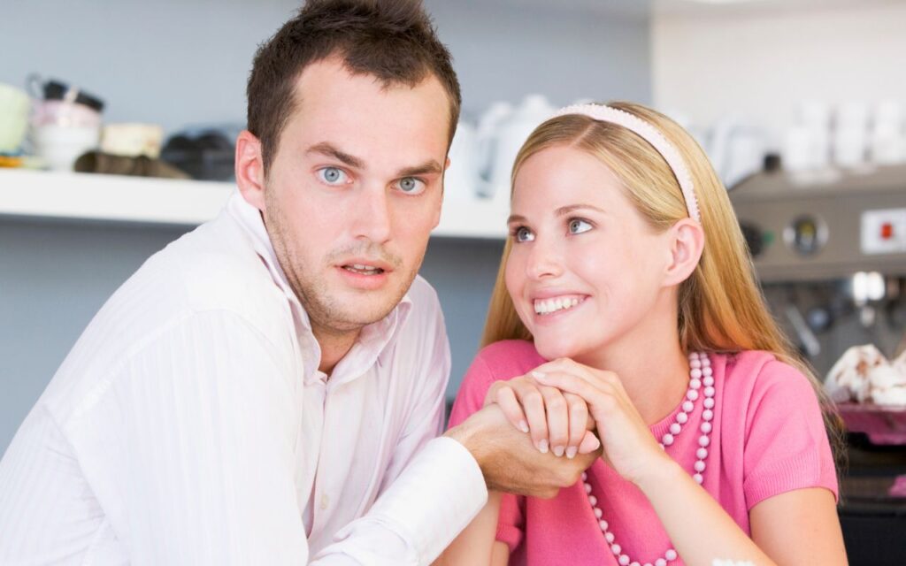 Man and woman, man looking worried