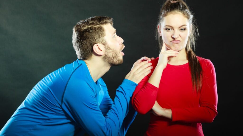 man begging and woman dismissive and upset