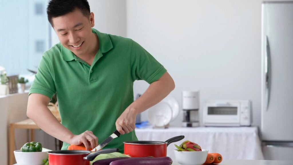 man cooking dinner