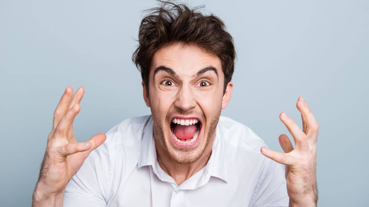 Man screaming looking angry