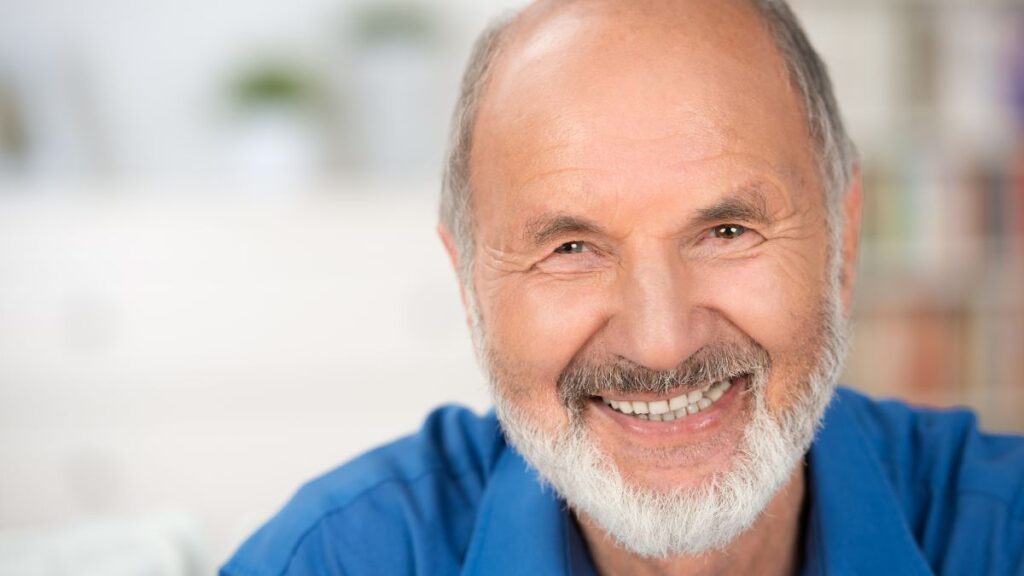 Older man wearing a blue shirt