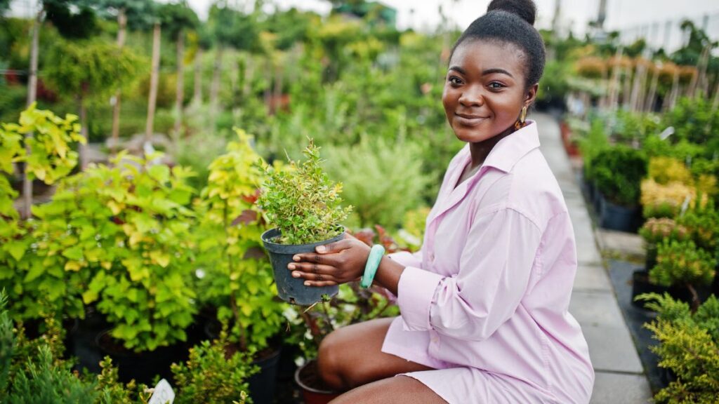 Personal growth woman holding a plant