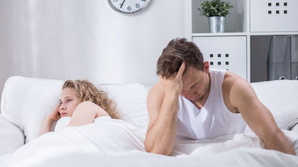 Couple upset in bed