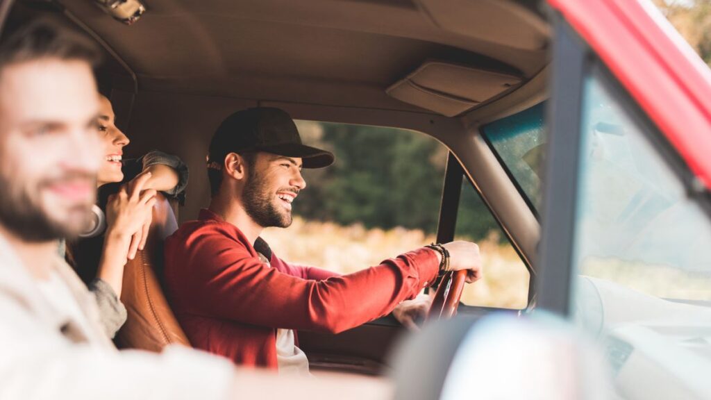 Road Trips friends in a truck on a roadtrip