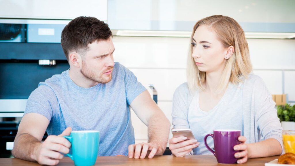 upset couple woman glaring at upset man