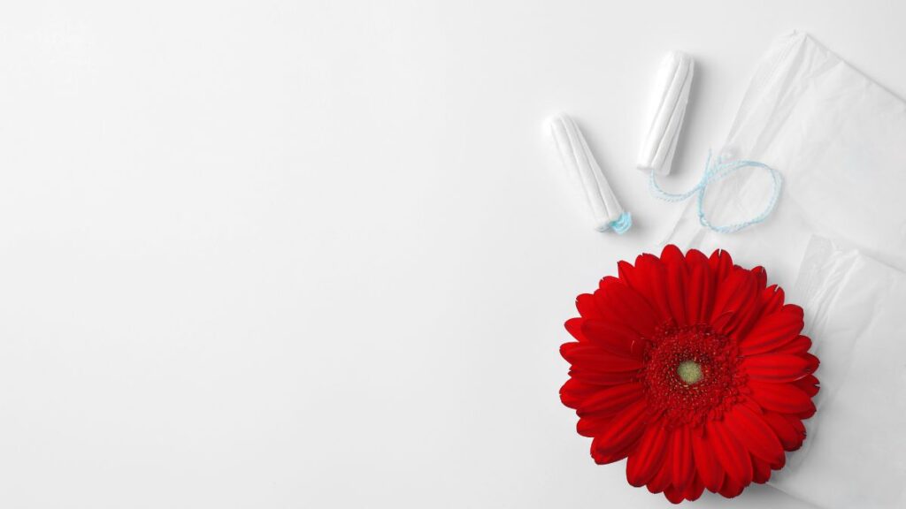 Using feminine hygiene products tampons and pads with a red flower