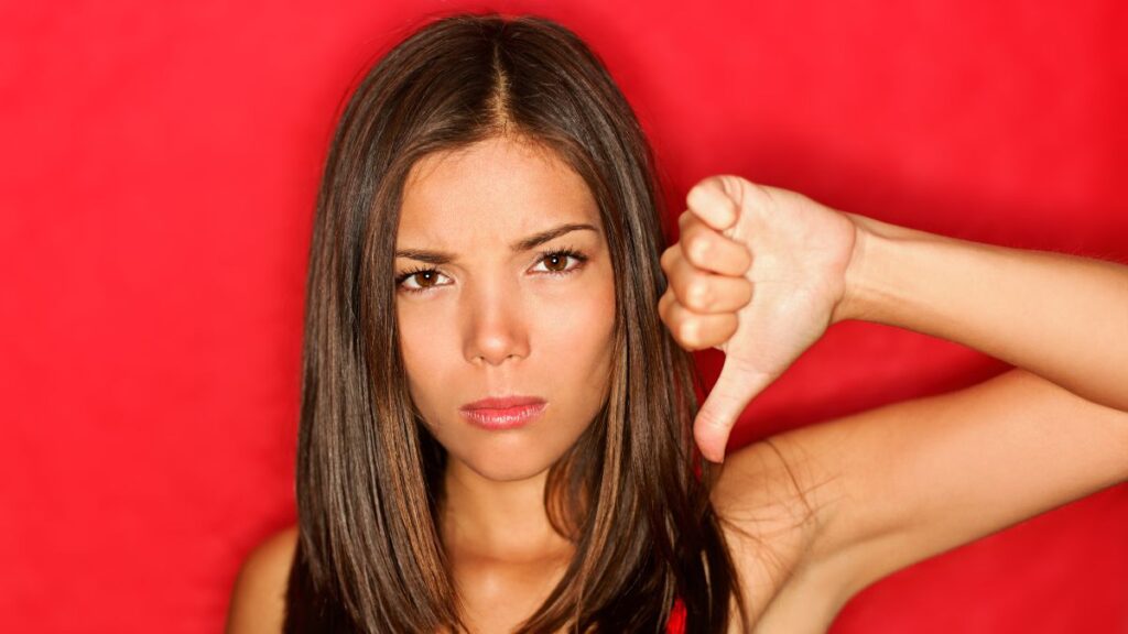 Woman doing a thumbs down