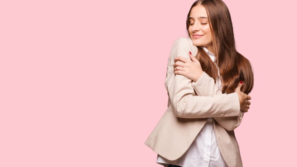 woman hugging herself