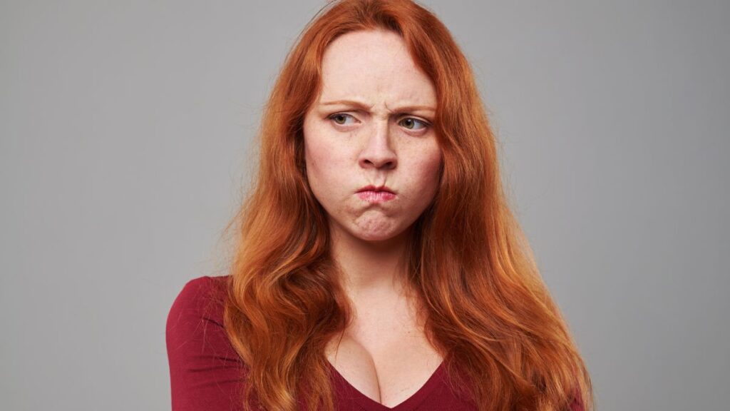 woman looking away and upset