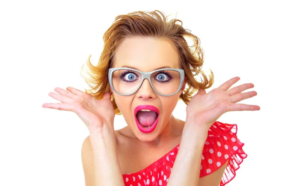 woman looking surprised with glasses on