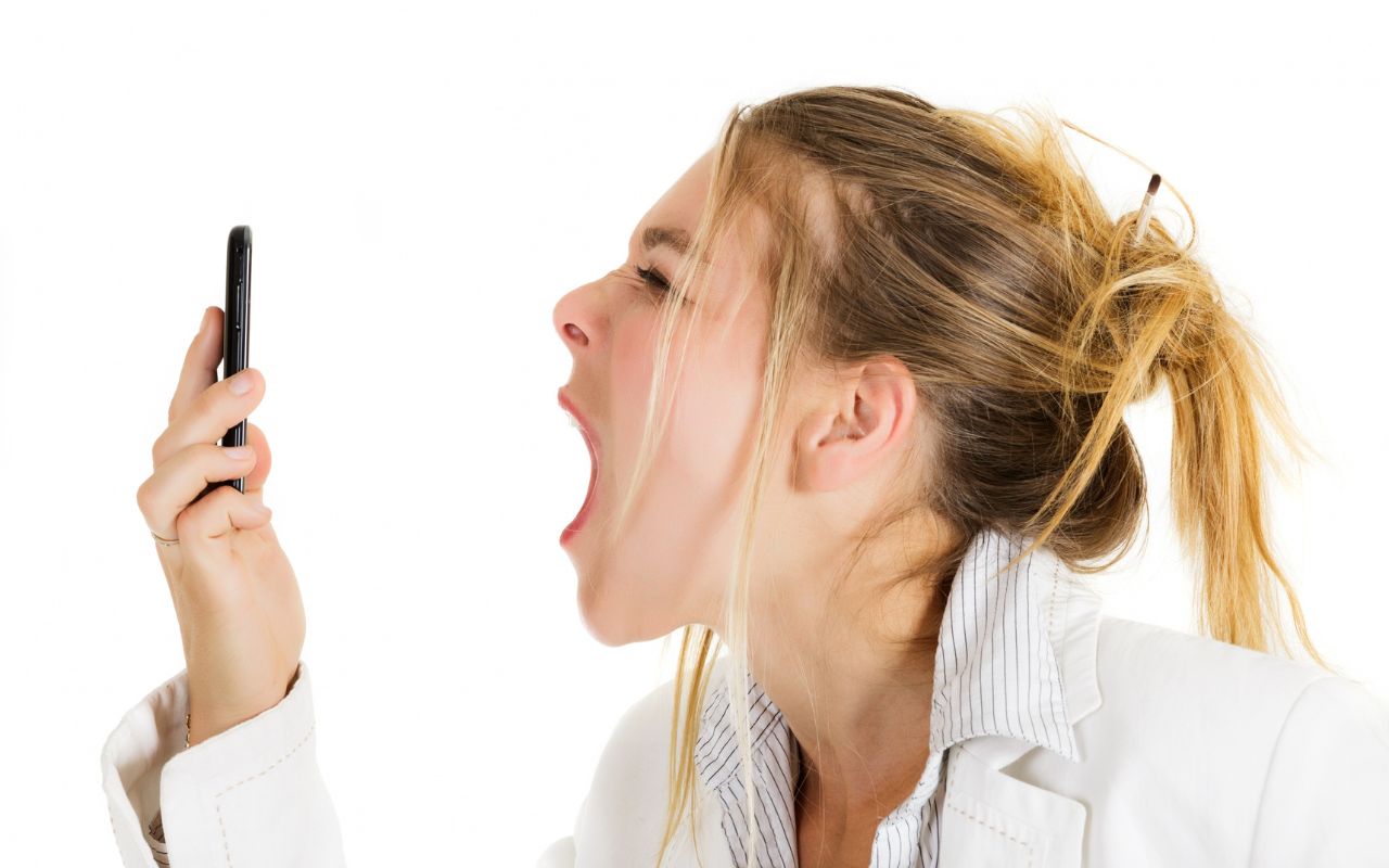 Woman screaming at her phone