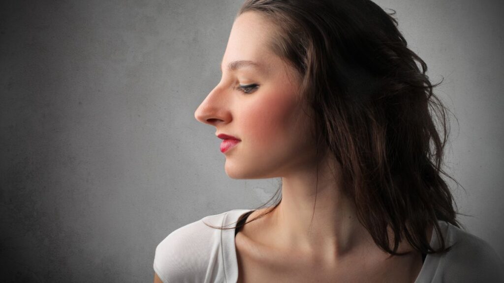 woman with big nose smiling