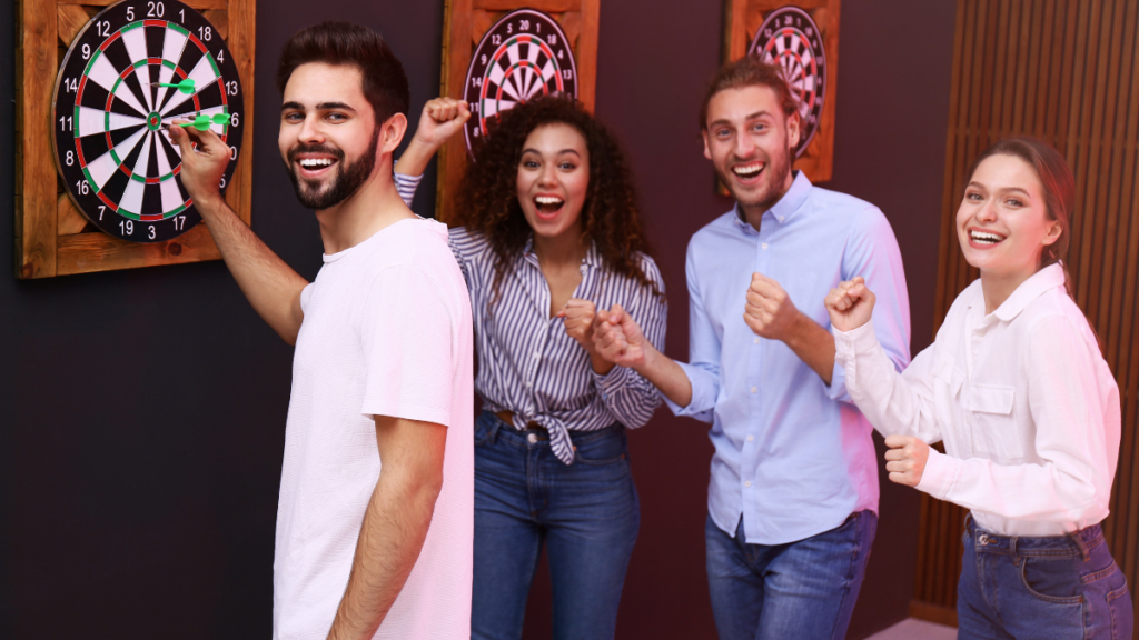 Friends playing darts