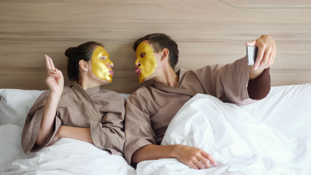 Couple in bed happy with face masks