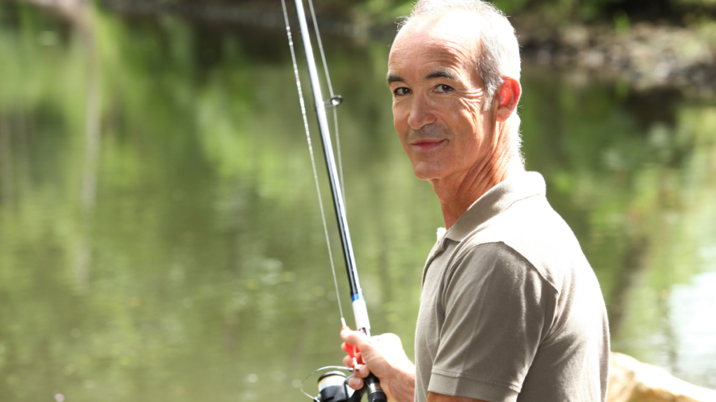 alone older man fishing