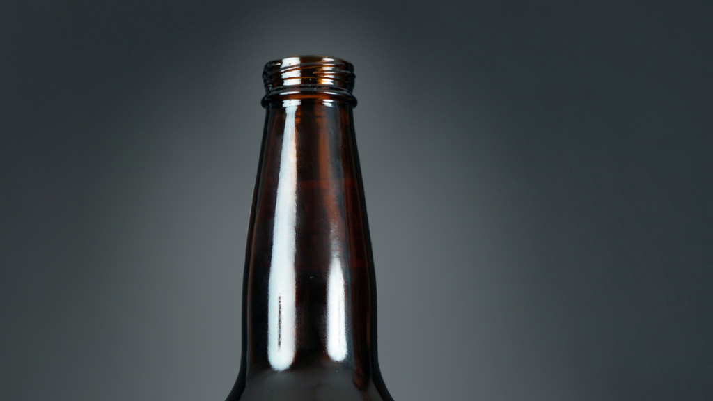 beer bottle on dark background