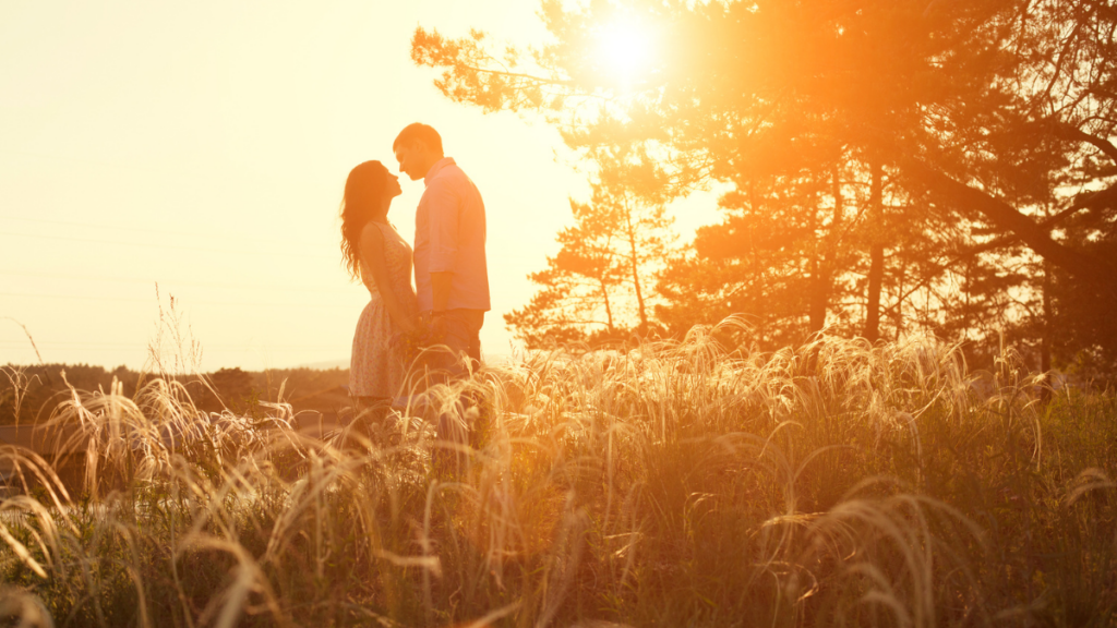 couple standing in a field