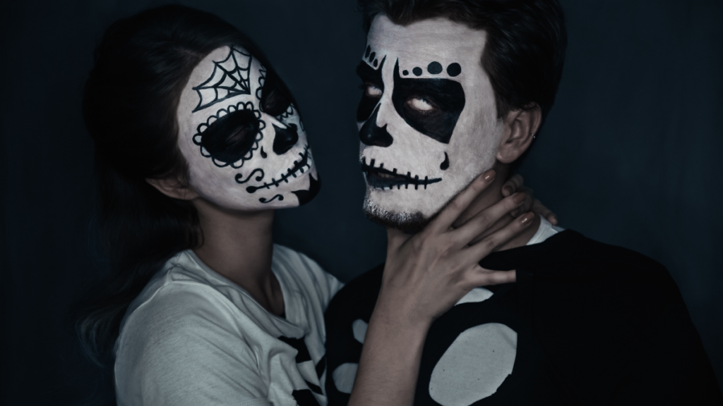 couple with skulls painted 