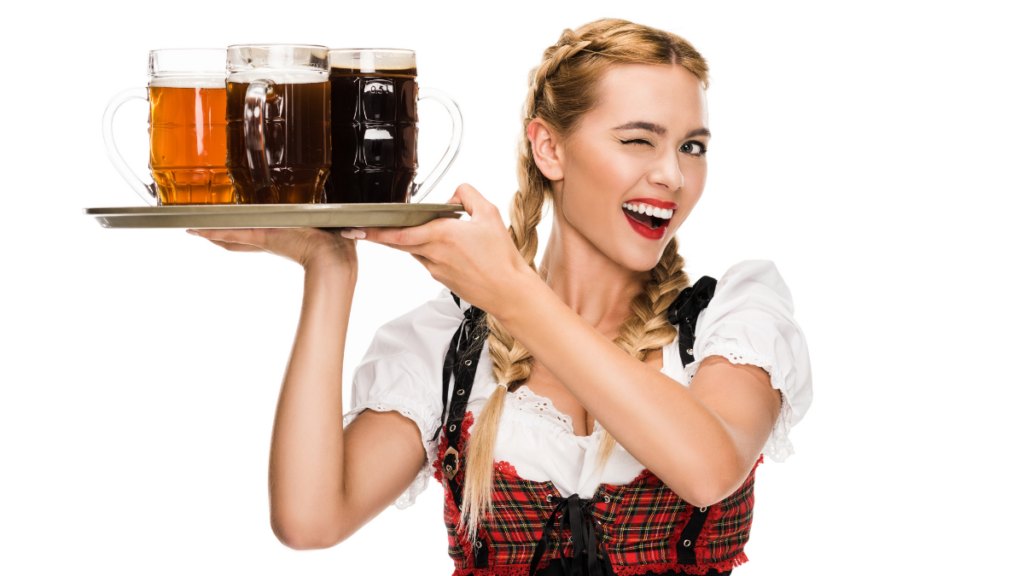 girl holding beer glasses