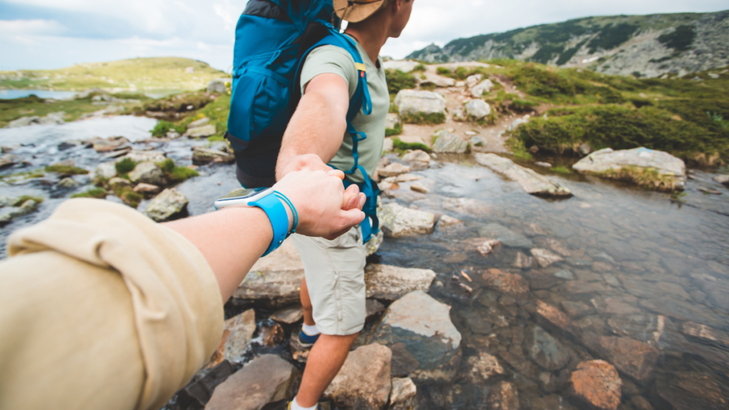 man and woman hiking