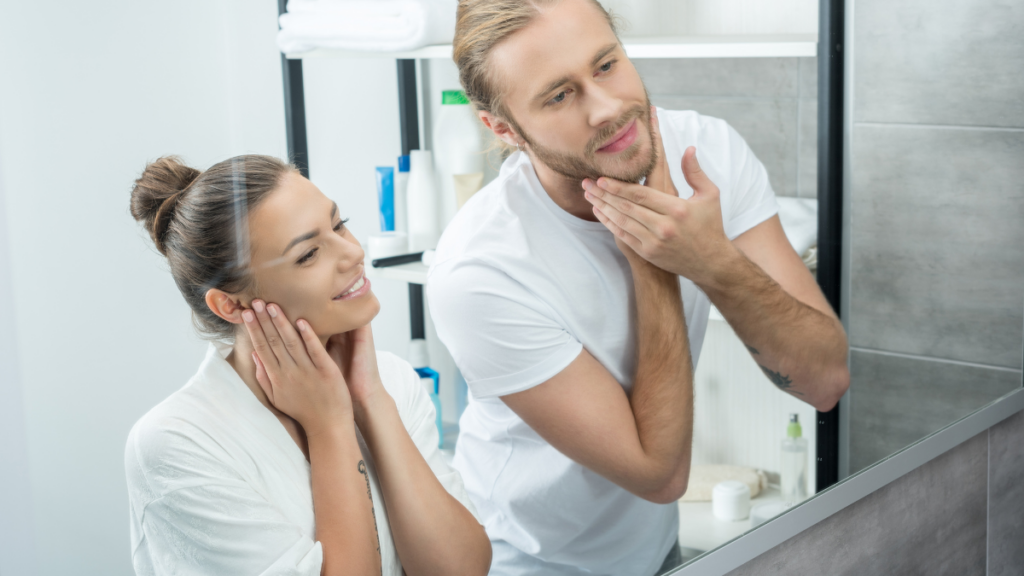 man and woman in mirror