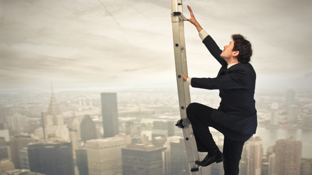 man climbing the corporate ladder