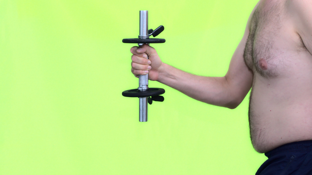 Man holding up dumbell