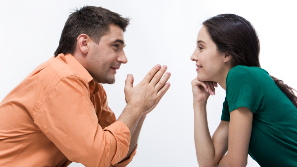 man talking to a woman